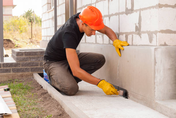 Waterproofing professionals working in Madison, IL